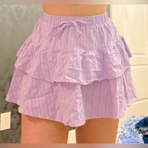 Cute double ruffle purple skirt. With bow but can fold over. Comfortable
